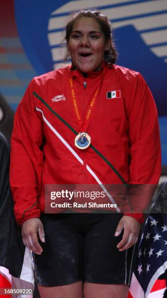 Gladis Bueno of Mexico A in the podium of Women's +75kg during day six of the 2013 Junior Weightlifting World Championship at Maria Angola Convention...