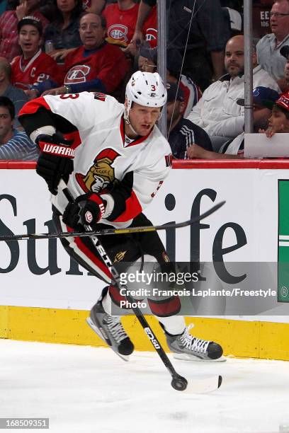 Marc Methot of the Ottawa Senators skates with the puck against the Montreal Canadiens in Game Five of the Eastern Conference Quarterfinals during...