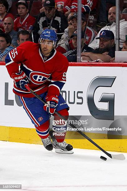 Francis Bouillon of the Montreal Canadiens skates with the puck against the Ottawa Senators in Game Five of the Eastern Conference Quarterfinals...