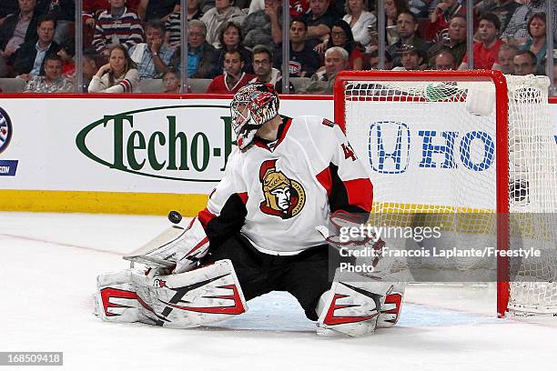 Craig Anderson of the Ottawa Senators makes a save against the Montreal Canadiens in Game Five of the Eastern Conference Quarterfinals during the...