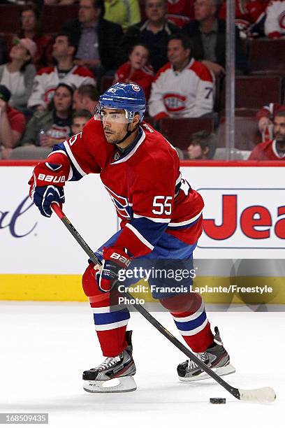 Francis Bouillon of the Montreal Canadiens skates with the puck against the Ottawa Senators in Game Five of the Eastern Conference Quarterfinals...