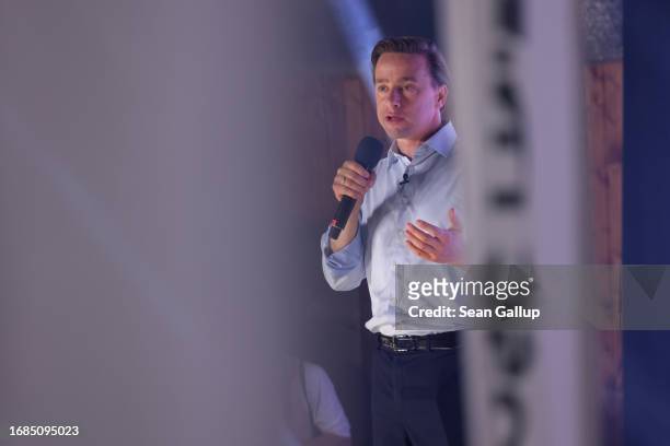 Krzysztof Bosak, co-leader of the Konfederacja alliance of right-wing and far-right political parties, speaks to supporters at an election campaign...