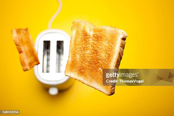jumping toast bread - flying food stock pictures, royalty-free photos & images