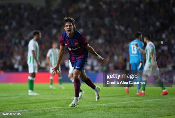 Joao Felix of FC Barcelona celebrates after scoring the team's first goal during the LaLiga EA Sports match between FC Barcelona and Real Betis at...