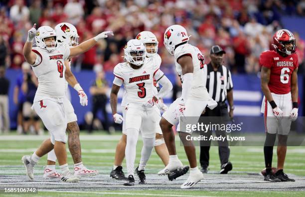 Quincy Riley of the Louisville Cardinals celebrates after the Cardinals stopped the Indiana Hoosiers on fourth down at Lucas Oil Stadium on September...