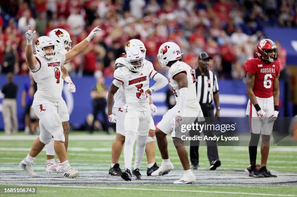 Quincy Riley of the Louisville Cardinals celebrates after the Cardinals stopped the Indiana Hoosiers on fourth down at Lucas Oil Stadium on September...