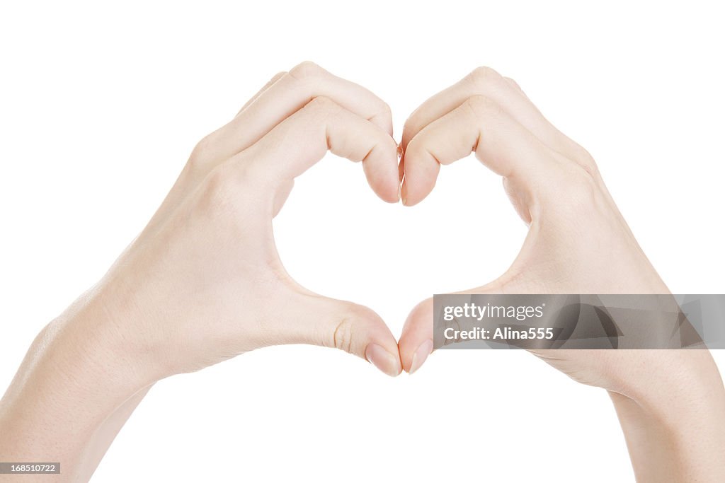 Love: Hands making a heat shape on white