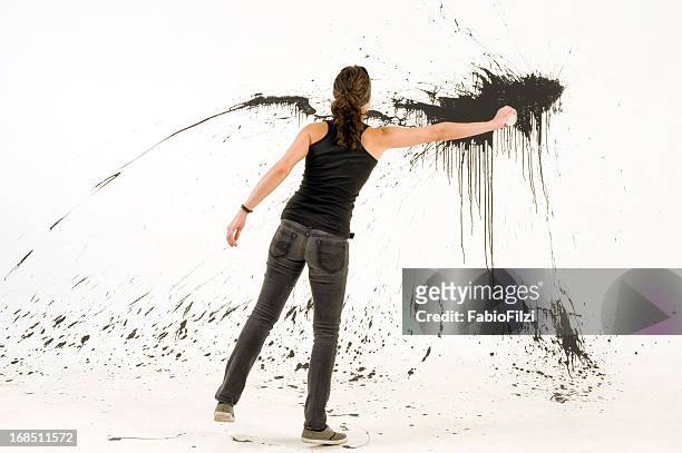woman splashing the wall - art modeling studios stock pictures, royalty-free photos & images