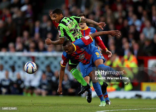 Kagisho Dikgacoi of Crystal Palace is challenged by Liam Bridcutt of Birghton & Hove Albion during the npower Championship play off semi final first...