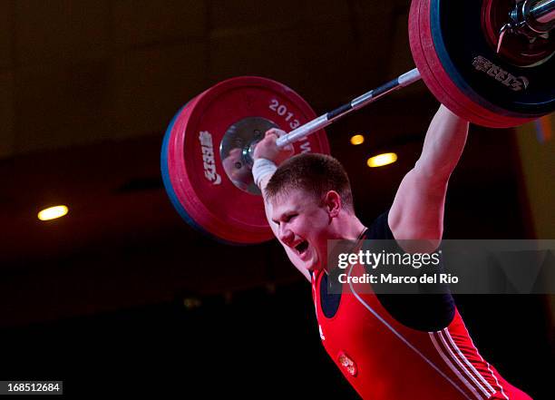Rodion Bochkov of Russia A competes in Men's 105kg during day seven of the 2013 Junior Weightlifting World Championship at Maria Angola Convention...