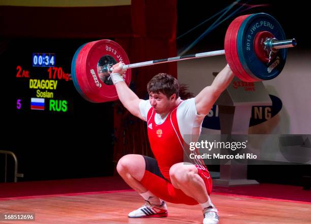 Soslan Dzagoev of Russia A competes in Men's 105kg during day seven of the 2013 Junior Weightlifting World Championship at Maria Angola Convention...