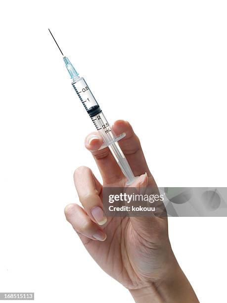 syringe - injecting bildbanksfoton och bilder