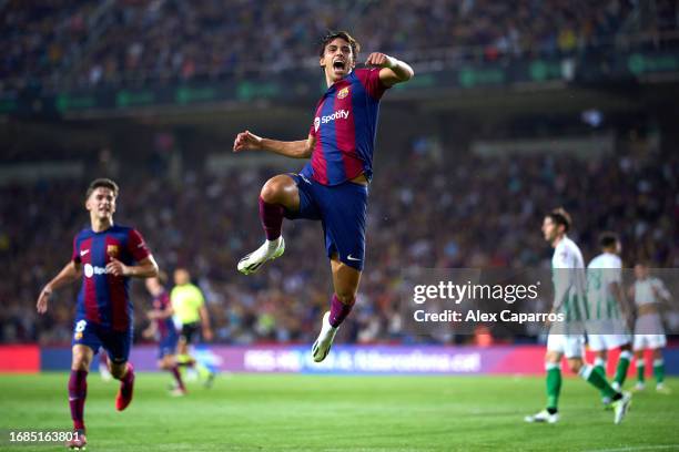 Joao Felix of FC Barcelona celebrates after scoring his team's first goal during the LaLiga EA Sports match between FC Barcelona and Real Betis at...