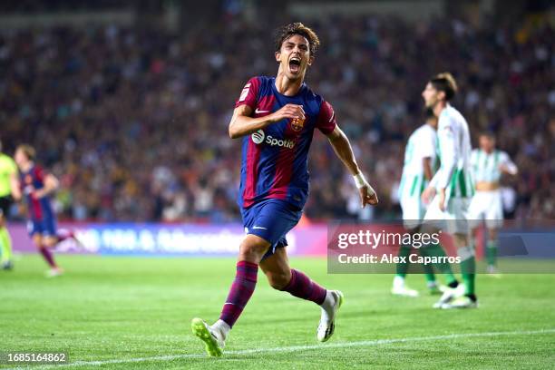 Joao Felix of FC Barcelona celebrates after scoring his team's first goal during the LaLiga EA Sports match between FC Barcelona and Real Betis at...