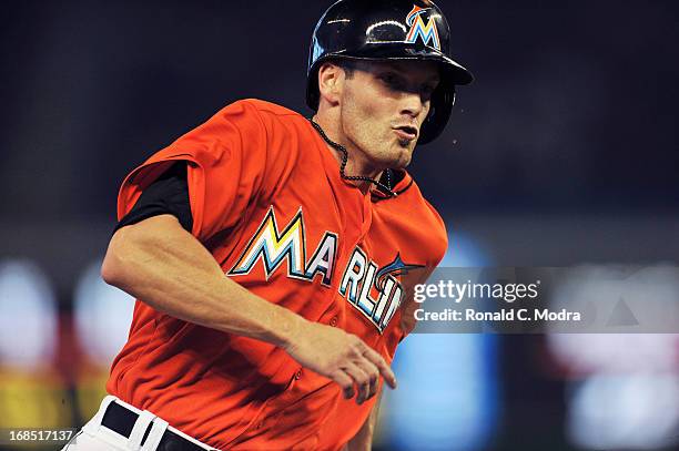 Nick Green of the Miami Marlins runs to third base during an MLB game against the New York Mets at Marlins Park on May 1, 2013 in Miami, Florida.