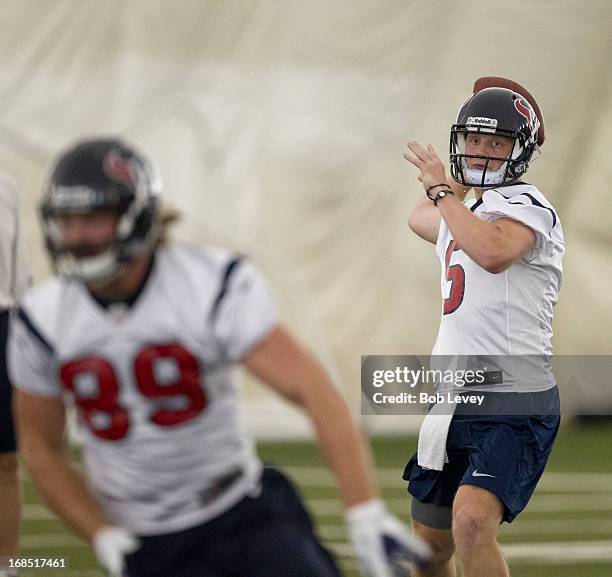 Quarterback Collin Klein of the Houston Texans throws a pass during Houston Texans rookie minin camp on May 10, 2013 in Houston, Texas.