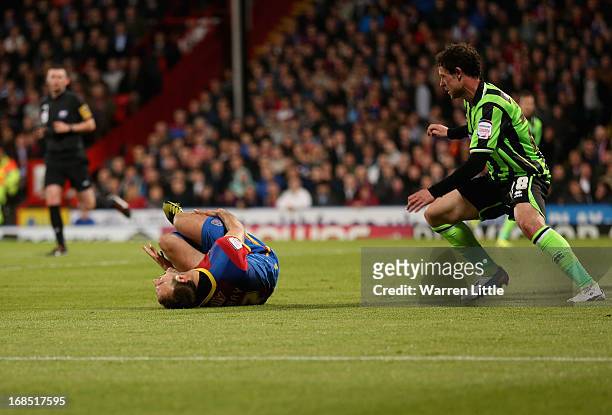 Glenn Murray of Crystal Palace is injured and stretchered off the pitch during the npower Championship play off semi final first leg at Selhurst Park...
