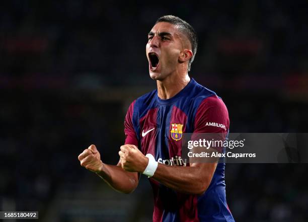 Ferran Torres of FC Barcelona celebrates after scoring the team's third goal during the LaLiga EA Sports match between FC Barcelona and Real Betis at...