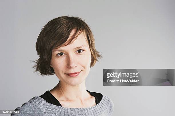 portrait of woman with short hair - eastern european woman stock pictures, royalty-free photos & images