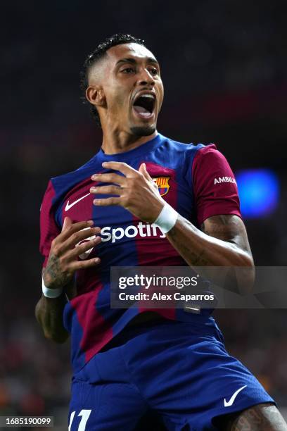 Raphinha of FC Barcelona celebrates after scoring the team's fourth goal during the LaLiga EA Sports match between FC Barcelona and Real Betis at...
