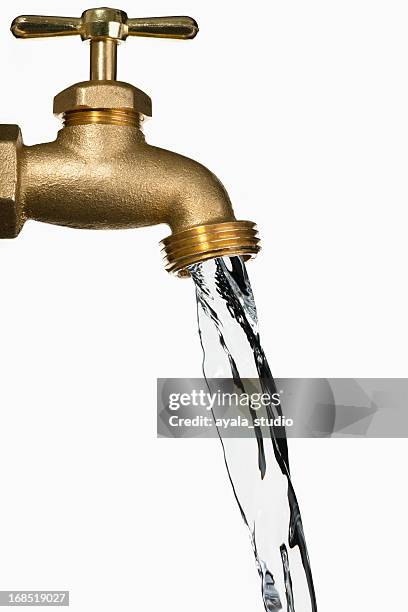 a bronze water faucet running isolated on white - running water isolated stock pictures, royalty-free photos & images