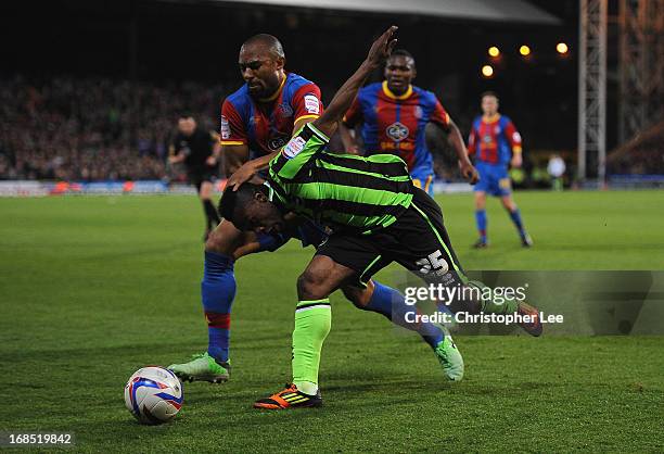 Danny Gabbidon of Palace battles with Kazenga LuaLua of Brighton during the npower Championship Play Off Semi Final, First Leg at Selhurst Park on...