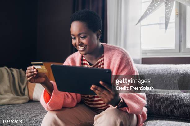 woman shopping online - pink suit stock pictures, royalty-free photos & images