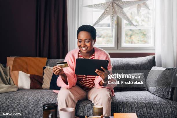 woman shopping online - pink suit stock pictures, royalty-free photos & images