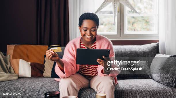 woman shopping online - pink suit stock pictures, royalty-free photos & images
