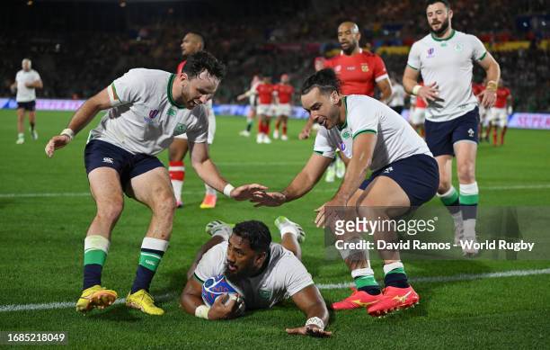 Bundee Aki of Ireland scores his team's sixth try during the Rugby World Cup France 2023 match between Ireland and Tonga at Stade de la Beaujoire on...