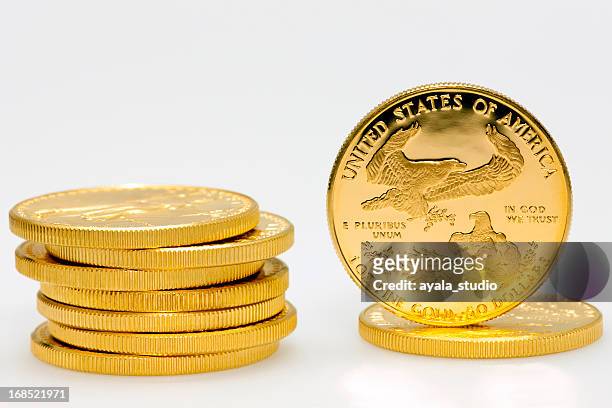 stack of american gold dollar coins - us coin 個照片及圖片檔