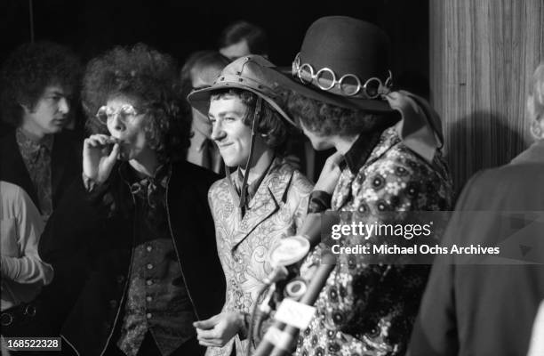 Noel Redding, Mitch Mitchell and Jimi Hendrix of The Jimi Hendrix Experience pose for photos at a multi band press conference titled 'The British Are...