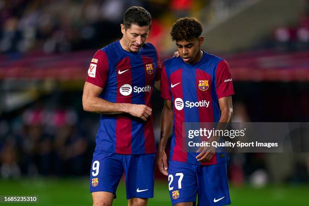 Robert Lewandowski and Lamine Yamal of FC Barcelona converses during the LaLiga EA Sports match between FC Barcelona and Real Betis at Estadi Olimpic...
