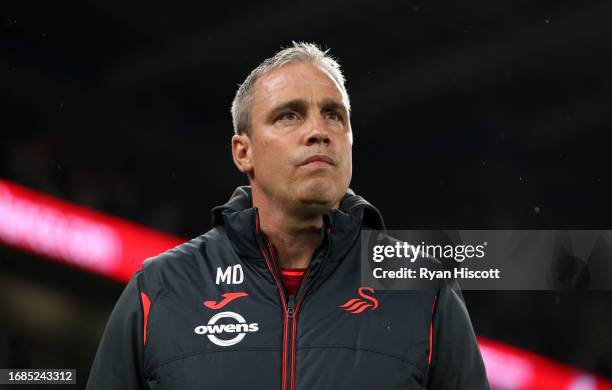 Michael Duff, Head Coach of Swansea City, looks on prior tothe Sky Bet Championship match between Cardiff City and Swansea City at Cardiff City...