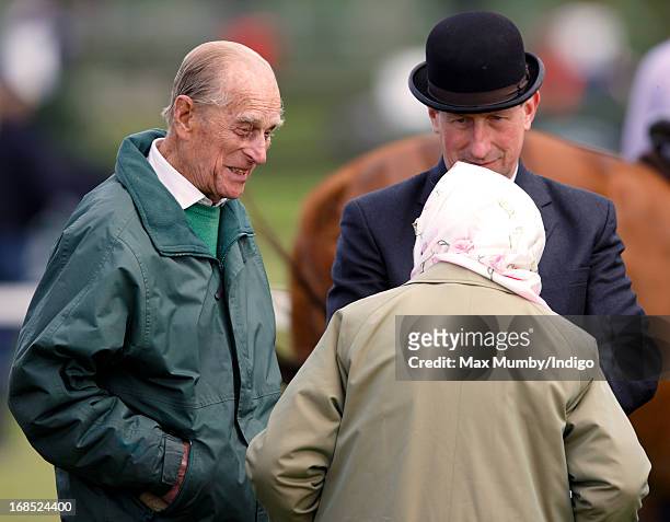 Prince Philip, Duke of Edinburgh and Queen Elizabeth II watch her horse Barbers Shop win the Tattersalls & Ror Thoroughbred Ridden Show Horse Class...