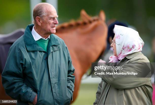 Prince Philip, Duke of Edinburgh and Queen Elizabeth II watch her horse Barbers Shop win the Tattersalls & Ror Thoroughbred Ridden Show Horse Class...