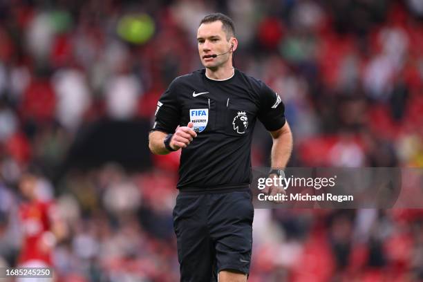 Referee Jarred Gillett looks on during the Premier League match between Manchester United and Brighton & Hove Albion at Old Trafford on September 16,...