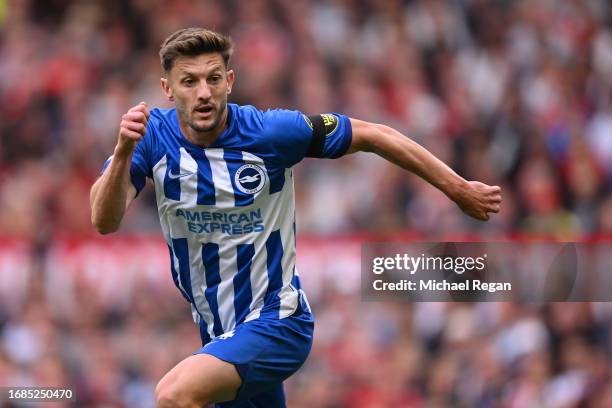 Adam Lallana of Brighton in action during the Premier League match between Manchester United and Brighton & Hove Albion at Old Trafford on September...