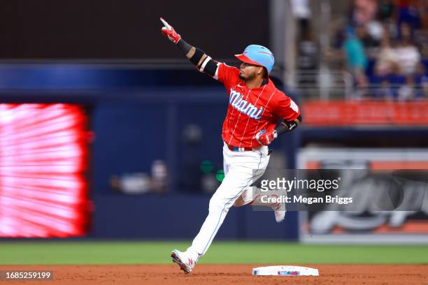 Luis Arraez of the Miami Marlins rounds the bases after hitting a home run against the Atlanta Braves during the first inning of the game at...