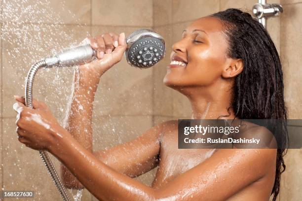 singing in shower. - singing shower stock pictures, royalty-free photos & images