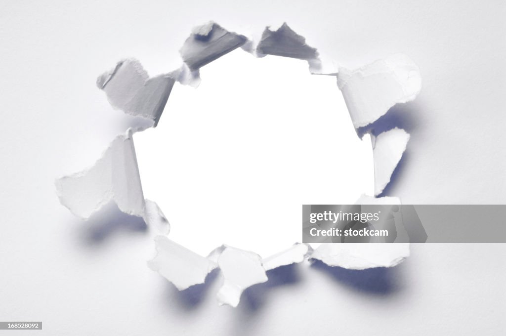 Ripped hole in blank paper