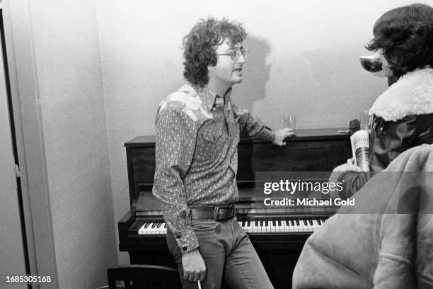 Singer and composer Randy Newman photographed backstage after his performance in Lincoln Center's Avery Fisher Hall, circa 1973 in New York City, New...