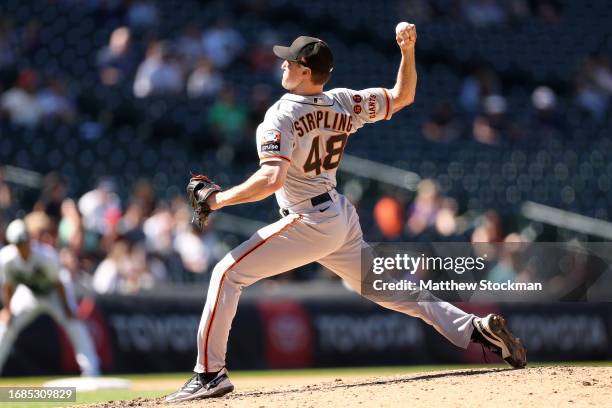 Ross Stripling of the San Francisco Giants throws against the Colorado Rockies in the sixth inning of Game One of a doubleheader at Coors Field on...