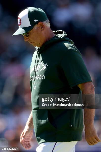 Manager Bud Black of the Colorado Rockies walks back the the dugout after changing pitchers against the San Francisco Giants in the seventh inning of...