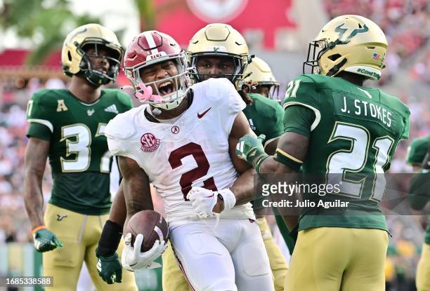 Jase McClellan of the Alabama Crimson Tide reacts after a 17-yard run in the second quarter against the South Florida Bulls at Raymond James Stadium...