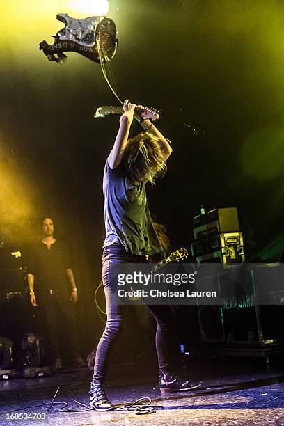Vocalist / guitarist Emily Armstrong of Dead Sara smashes a guitar while performing at El Rey Theatre on May 9, 2013 in Los Angeles, California.