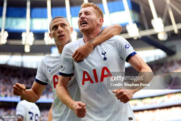 Dejan Kulusevski of Tottenham Hotspur celebrates with teammate Richarlison after scoring the team's second goal during the Premier League match...