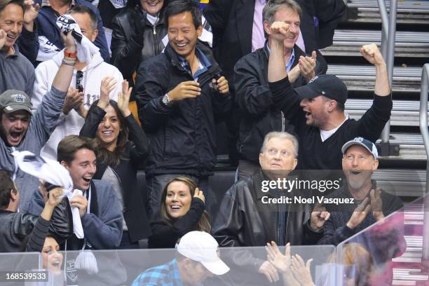 Alyssa Milano and husband David Bugliari attend an NHL playoff game between the St. Louis Blues and the Los Angeles Kings at Staples Center on May...