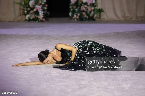 Model walks the runway at the Richard Quinn show during London Fashion Week September 2023 at the Andaz Hotel on September 16, 2023 in London,...