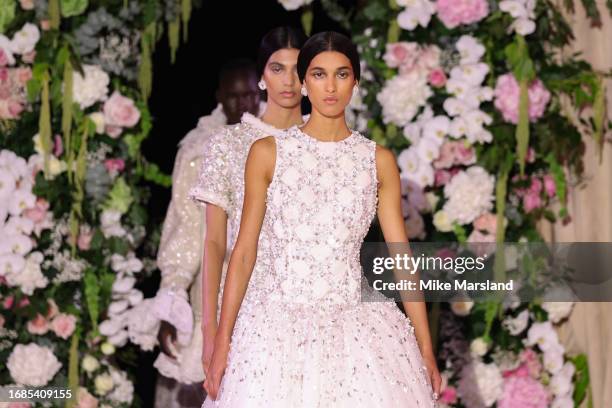 Model walks the runway at the Richard Quinn show during London Fashion Week September 2023 at the Andaz Hotel on September 16, 2023 in London,...